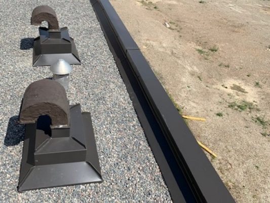 Image depicts an after image from a roof replacement project in Lambton, County