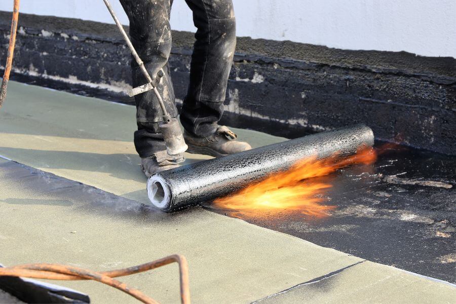 torch down method for mod bit roofing installation on flat roof