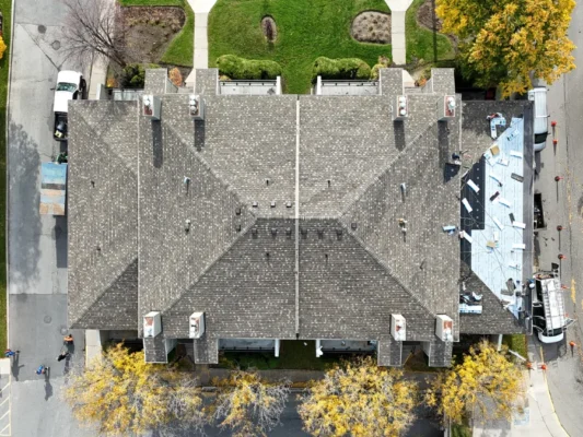 replacing shingles on condominium roofs