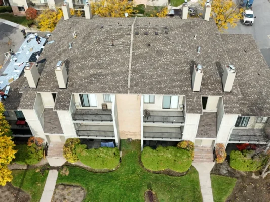 replacing shingles on multi unit roofs