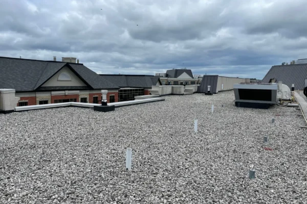 before upgrading flat roofing system