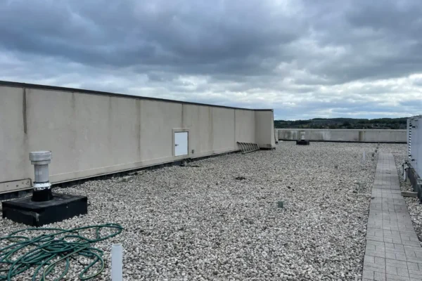 old roofing system with walkway