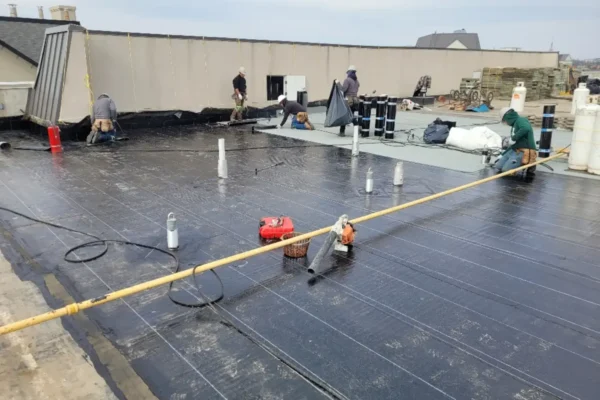 roofing contractors replacing membrane