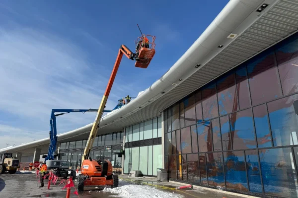 professional company removing snow commercial roofs